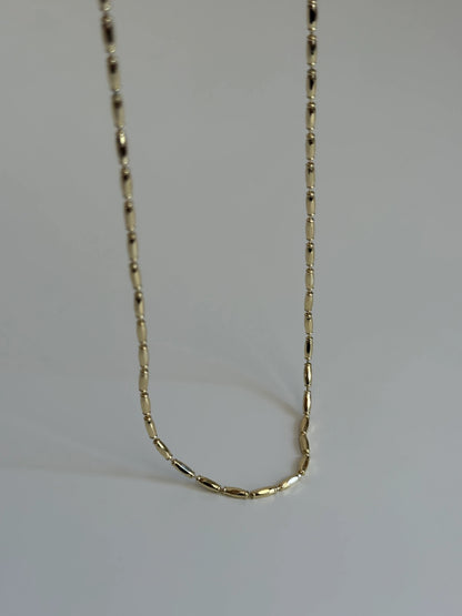 Gold Rengi Bombeli Şerit Model Kadın Kolye