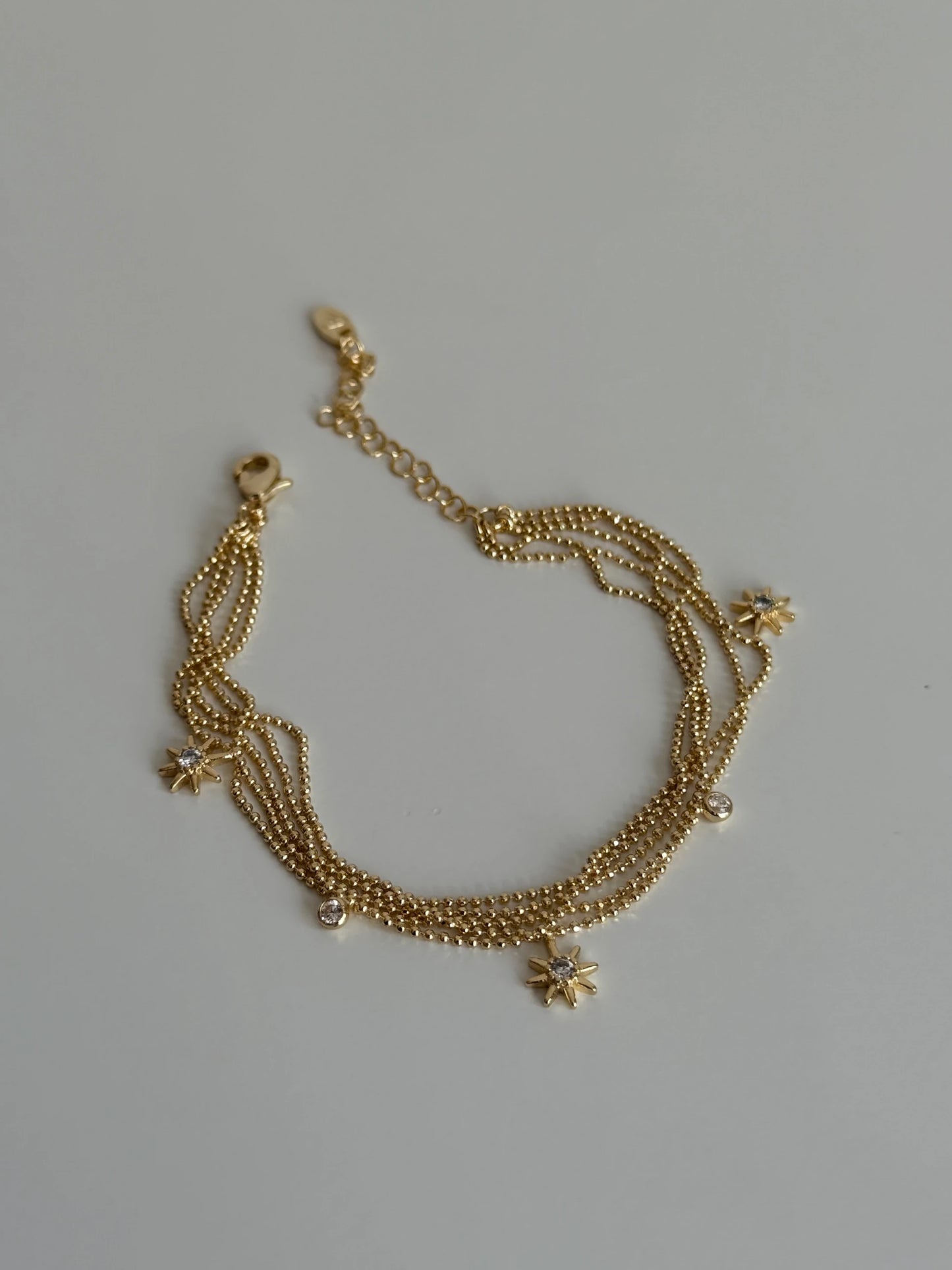 Gold Rengi Beş Sıra Kutup Yıldızı Sallantılı Kadın Bileklik