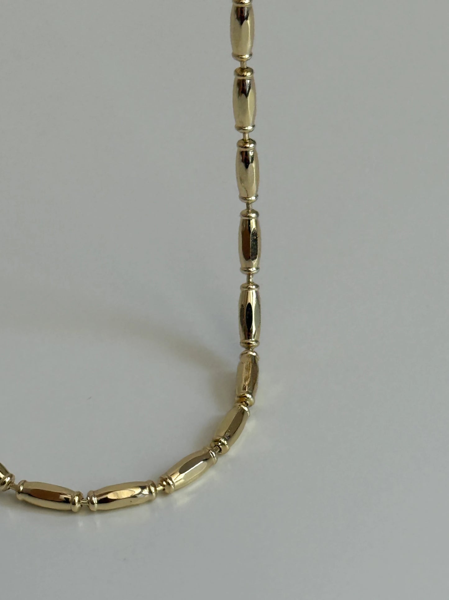 Gold Rengi Bombeli Şerit Model Kadın Kolye